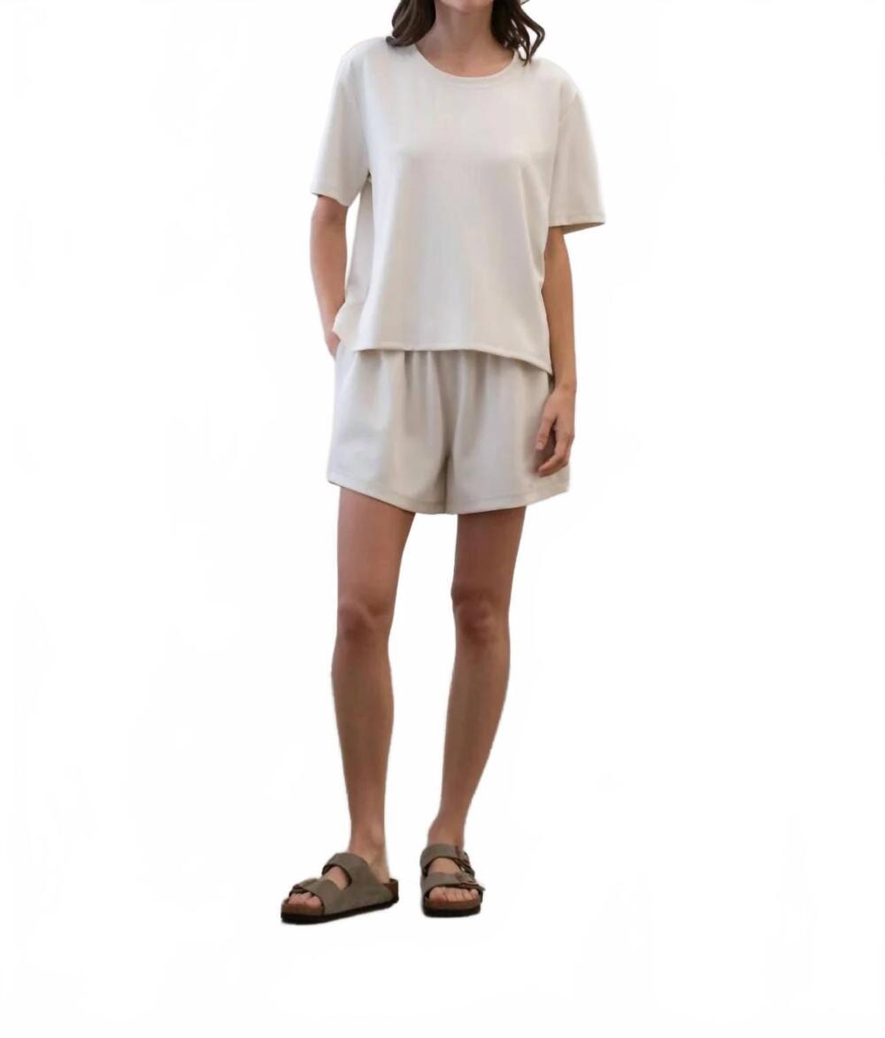 NEW ELLE GREY women's high low short sleeve top in ivory